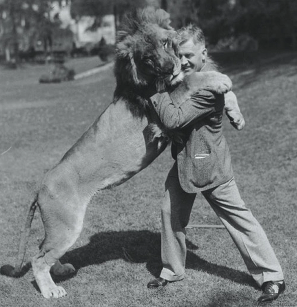 Coulson Glick wrestling a lion